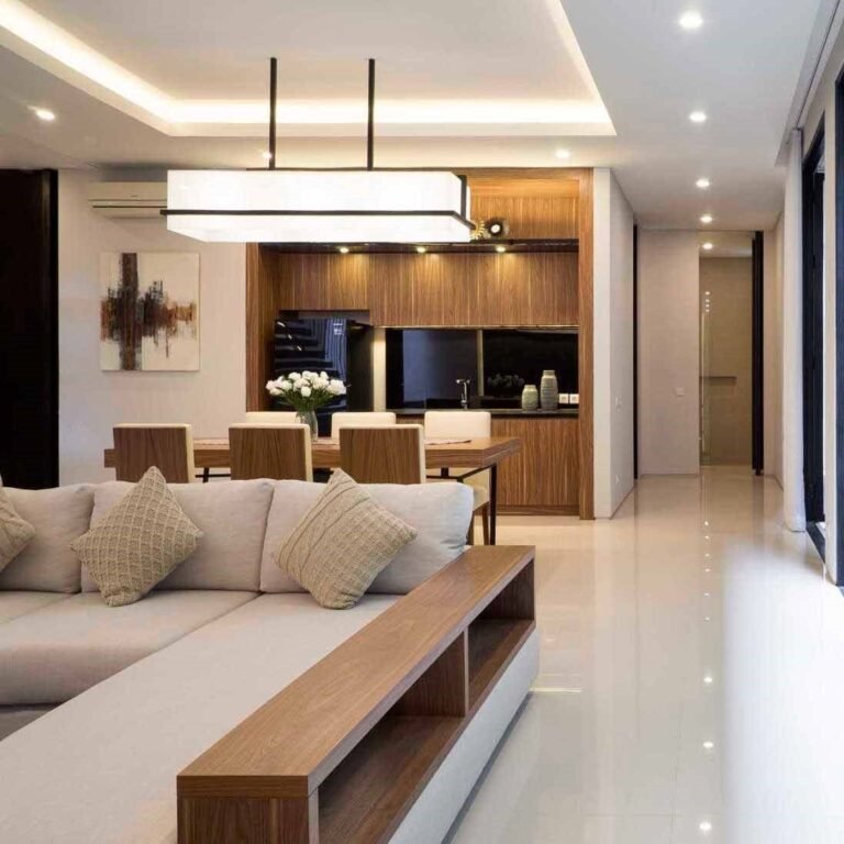 Interior ruang tamu dengan desain modern dan elegan, mengutamakan kenyamanan dan fungsionalitas.